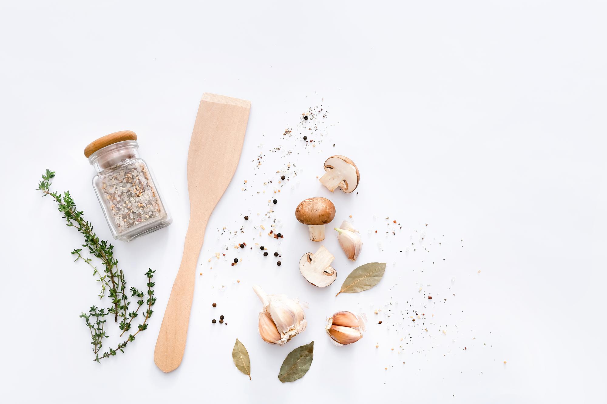 Cozy artisanal kitchen workspace with herbs and tools